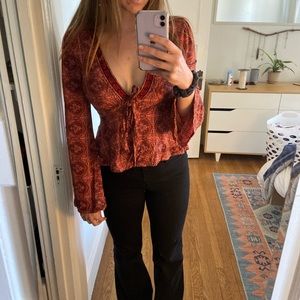 Orange long sleeve free people top